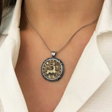 Sagittarius pendant on ladies neck